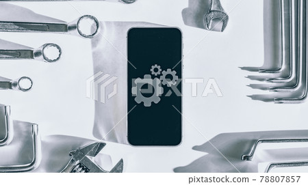 Repair phone. Technician workplace with phone and special repairing tools. Disassembling, diagnostic and repairman smartphone. 78807857