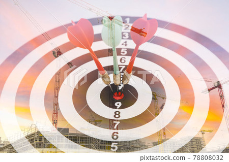 Close up shot of the dart arrow hit on bullseye, red dart arrow hitting in the target center of dartboard Target hit in the center, challenge in business marketing,Target and goal as concept. 78808032