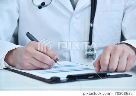 Doctor hand filling patient history list Doctor hand filling patient history list 78808683