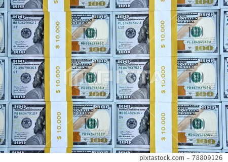 Top view of many bundles of one hundred dollar bills Top view of many bundles of one hundred dollar bills 78809126