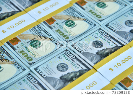 Many hundred dollar bills background. 78809128
