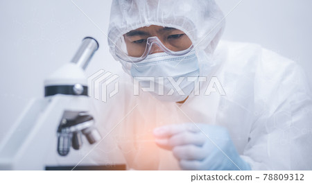 biochemical research scientist working with microscope for coronavirus, laboratory glassware containing chemical liquid for design or decorate science, chemistry, biology, medicine and people concept 78809312