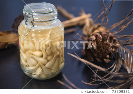 Pickled scallions in a bottle Pickled scallions in a bottle 78809381