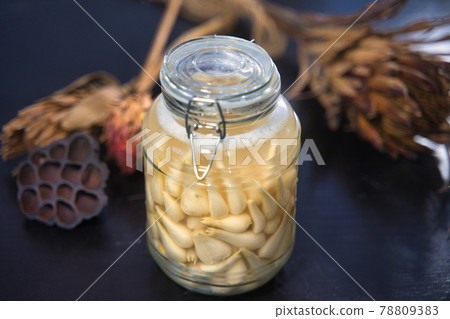 Pickled scallions in a bottle Pickled scallions in a bottle 78809383