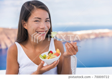 Healthy food woman eating fruits weight loss diet 78809722