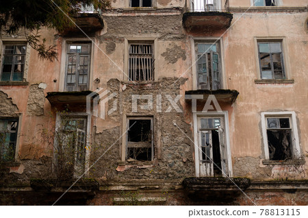 View of the facade of an abandoned ruined house in abkhazia. View of the facade of an abandoned ruined house in abkhazia. 78813115
