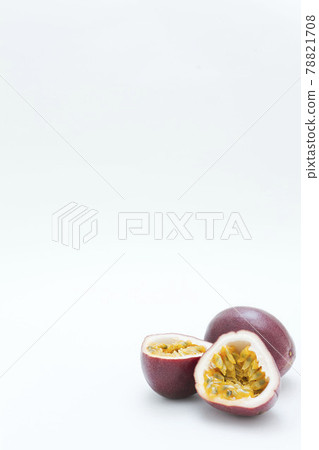 Two passion fruits inside and outside the cut fruit Two passion fruits inside and outside the cut fruit 78821708