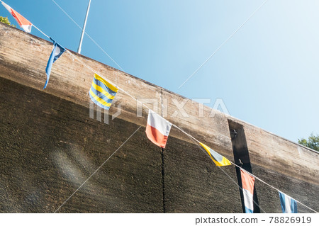 Nautical flags on the ship in the lock Nautical flags on the ship in the lock 78826919