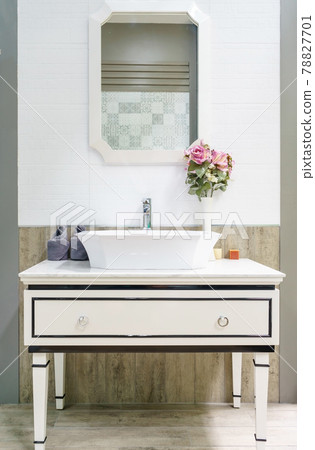 Interior of bathroom with sink basin faucet and mirror. Modern design of bathroom Interior of bathroom with sink basin faucet and mirror. Modern design of bathroom 78827701