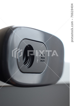 A modern web camera is installed on the body of a flat screen monitor. Device for video communication and recording of high quality video A modern web camera is installed on the body of a flat screen monitor. Device for video communication and recording of high quality video 78828404