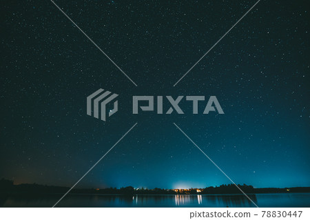 Village Novoye Lyadno, Lyepyel District, Vitebsk Province, Belarus. Night Stars Above Lepel Lake. Natural Starry Sky Background Backdrop Landscape 78830447