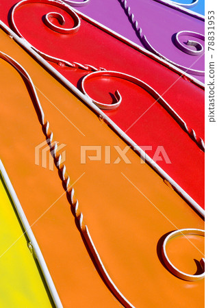 Metal texture of a piece of colored wall with a forged pattern 78831953