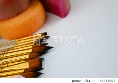 Color cosmetics, brushes and sponges for face painting on white background Color cosmetics, brushes and sponges for face painting on white background 78831991