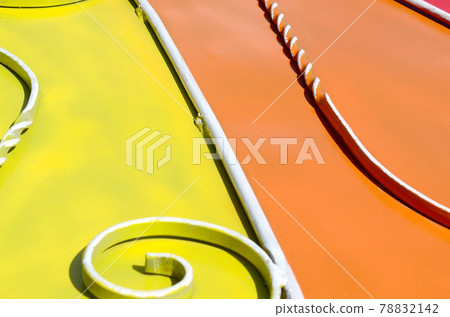 Metal texture of a piece of colored wall with a forged pattern Metal texture of a piece of colored wall with a forged pattern 78832142