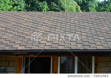 Modern roofing and decoration of chimneys. Flexible bitumen or slate shingles Modern roofing and decoration of chimneys. Flexible bitumen or slate shingles 78832463