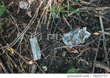 plastic waste, glass, ceramics and rubbish in the forest. Environmental pollution. Environmental issue and disaster. Go Green, Zero Waste, Save the Planet, Earth Day, No Plastic, Recycling Concept 78832773