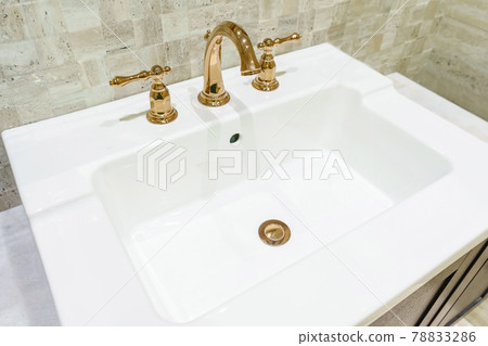 Interior of bathroom with sink basin faucet and mirror. Modern design of bathroom Interior of bathroom with sink basin faucet and mirror. Modern design of bathroom 78833286