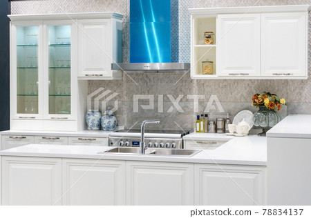 New modern, bright, clean, kitchen interior with stainless steel appliances in a luxury house 78834137