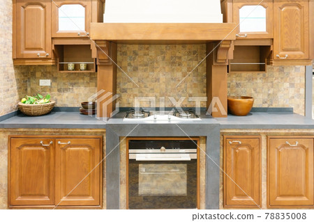 Modern, bright, clean kitchen interior with stainless steel appliances in a luxury apartment. Modern, bright, clean kitchen interior with stainless steel appliances in a luxury apartment. 78835008