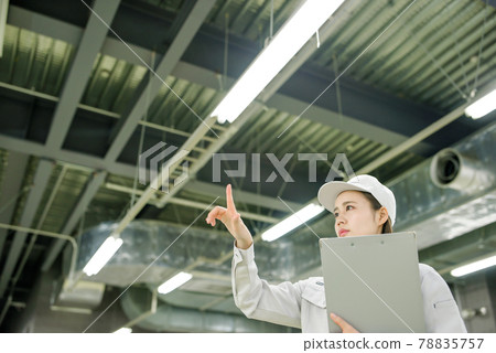Technicians working in production / factory 78835757