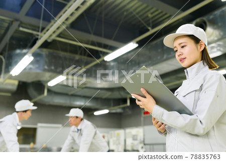 Technicians working in production / factory Technicians working in production / factory 78835763