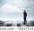Businessman looking on sky front and he see word "free" inside cloudy by ambitious. Business Concept 78837158