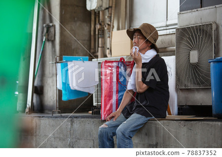 Street life tired homeless sitting 78837352