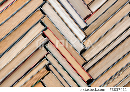 A pattern of old books with a top view. Solid background 78837411
