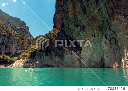 Man on a kayak on the waters of the Mont Rebei Gorge in Catalonia 78837436