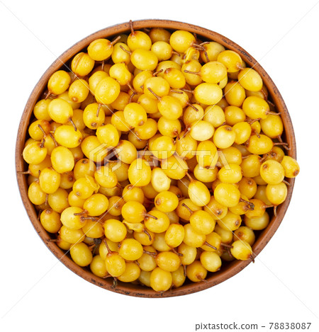Ripe sea buckthorn in a clay bowl isolated on white background. 78838087