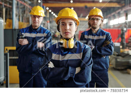 Young woman working at factory Young woman working at factory 78838734