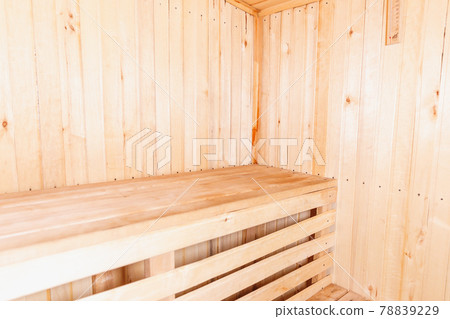 Interior details of traditional Finnish sauna steam room. Traditional old Russian bathhouse SPA Concept. Relax country village bath concept. Interior details of traditional Finnish sauna steam room. Traditional old Russian bathhouse SPA Concept. Relax country village bath concept. 78839229