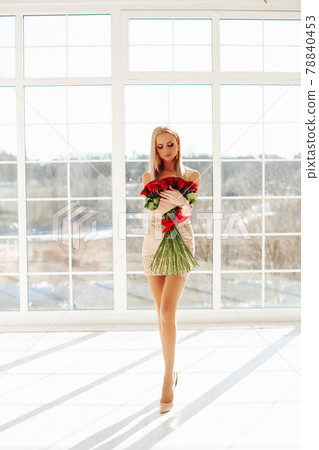 Beautiful young blond girl female fashion model 78840453