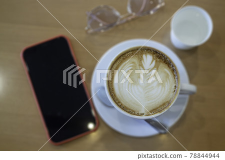 Coffee cup hot latte on wooden table 78844944