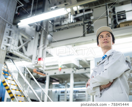 Technicians working in production / factory 78845444
