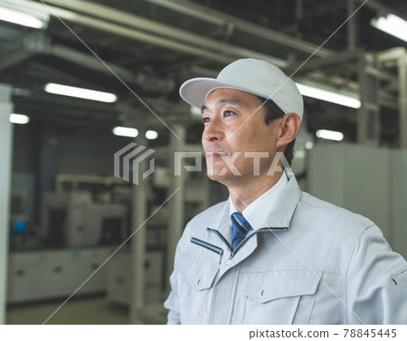 Technicians working in production / factory 78845445