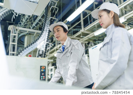 Technicians working in production / factory 78845454