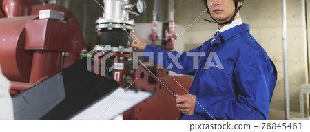 Technicians working in production / factory 78845461