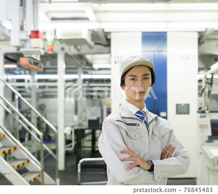 Technicians working in production / factory 78845483