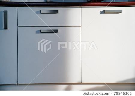 white doors of the kitchen cupboard. furniture for interior of the house. 78846305