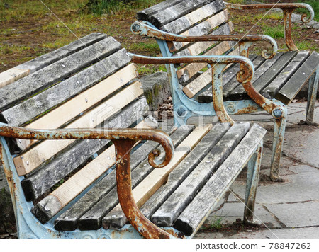 Old bench in a lonely park 78847262