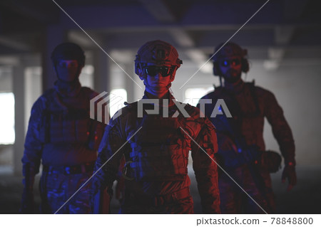 soldier squad team walking in urban environment colored lightis soldier squad team walking in urban environment colored lightis 78848800