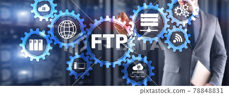 Businessman pressing touch screen FTP. Blue IT concept 78848831