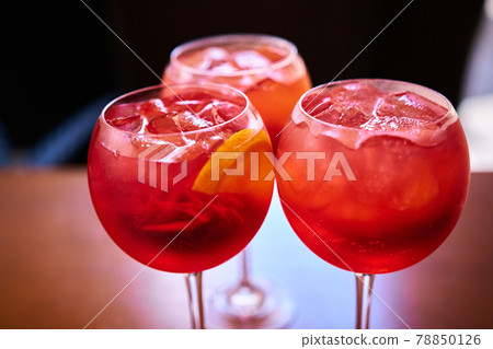 Aperol Spritz cocktail aperitif outdoors with shallow depth of field 78850126