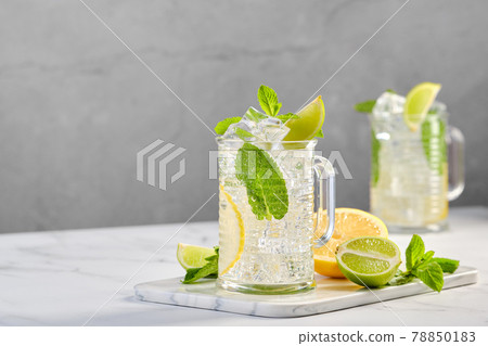 Two glasses of lemon, lime and mint cold lemonade 78850183
