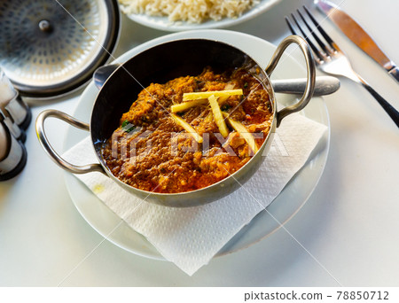 Traditional Indian lamb karahi curry white ginger and rice Traditional Indian lamb karahi curry white ginger and rice 78850712