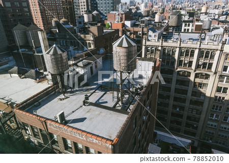 Wooden Water Towers on the Rooftops of Old Buildings of New York Wooden Water Towers on the Rooftops of Old Buildings of New York 78852010