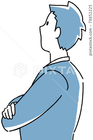 A man with his arms folded and looking up at the background A man with his arms folded and looking up at the background 78852225
