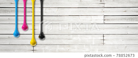 cmyk ink drops on white wooden banner background 78852673