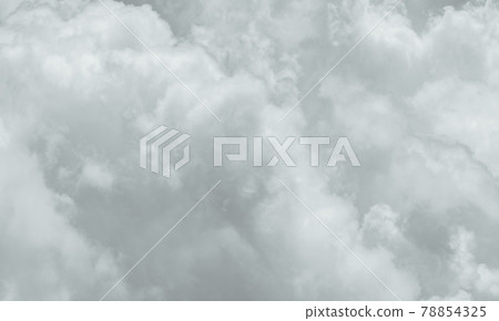 Grey and white fluffy clouds texture. Closeup detail of white clouds texture background. Soft-touch feeling like cotton. White puffy clouds. Gloomy and moody sky. Background for dead and tranquility. 78854325